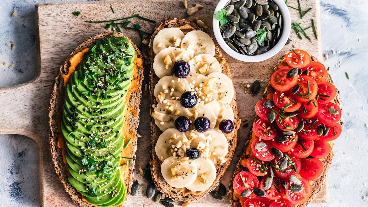 Bread toasts with avocado, banana, tomato. Easy to make, great for a quick breakfast.